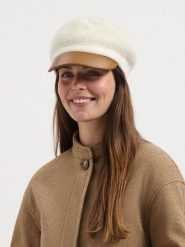 TRAVELIN' Wełniana czapka w kolorze kremowo-jasnobrązowym rozmiar: onesize. Brązowe czapki z daszkiem damskie Travelin', bez wzorów, ze skóry. Za 173.99 zł.