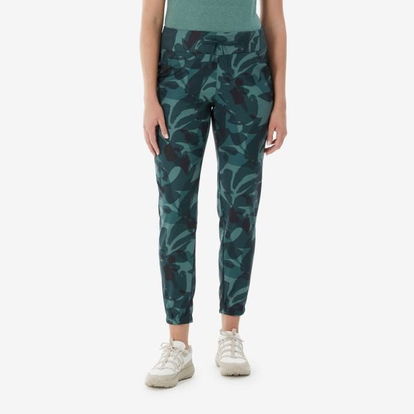 Spodnie turystyczne damskie Quechua NH100. Zielone spodnie materiałowe damskie QUECHUA, bez wzorów, z materiału, sportowe. Za 59.99 zł.