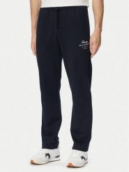 Tommy Hilfiger Spodnie dresowe Script Stack MW0MW44332 Granatowy Regular Fit. Niebieskie spodnie dresowe męskie Tommy Hilfiger, bez wzorów, z bawełny. Za 489.99 zł.