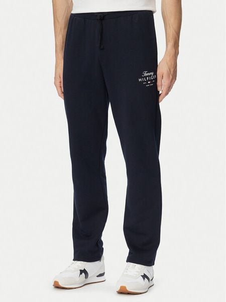 Tommy Hilfiger Spodnie dresowe Script Stack MW0MW44332 Granatowy Regular Fit. Niebieskie spodnie dresowe męskie Tommy Hilfiger, bez wzorów, z bawełny. Za 489.99 zł.