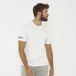 Biała koszulka ARIA z bawełny. Białe bluzki sportowe damskie Legea, z bawełny, bez kołnierzyka, bez ramiączek. Za 52.00 zł.