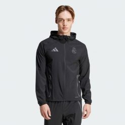 Kurtka z kapturem Real Madrid Tiro 2024/25. Czarne kurtki męskie Adidas, xs, bez wzorów, sportowe, z kapturem. W wyprzedaży za 335.00 zł.