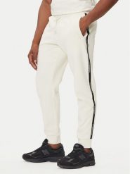 EA7 Emporio Armani Spodnie dresowe 7M000974 AF10377 U1105 Beżowy Regular Fit. Brązowe spodnie dresowe męskie EA7 Emporio Armani, bez wzorów, z bawełny. Za 429.99 zł.