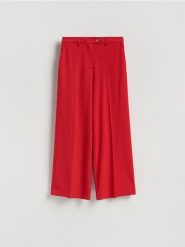 Spodnie w kant z wiskozą - czerwony. Czerwone spodnie materiałowe damskie Reserved, bez wzorów, z tkaniny. Za 139.99 zł.