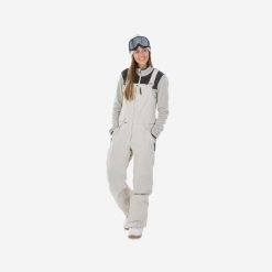 Second Life - Spodnie snowboardowe ogrodniczki damskie... - Stan Dobry. Brązowe spodnie materiałowe damskie DREAMSCAPE, bez wzorów, z materiału, z podwyższonym stanem. Za 399.00 zł.