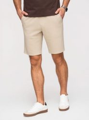 Szorty męskie strukturalne REGULAR FIT - beżowe V1 - Rozmiar: XXL. Brązowe szorty męskie Ombre Clothing, z dzianiny, bez kołnierzyka. Za 149.99 zł.