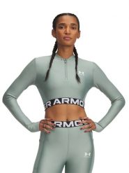 Under Armour Koszulka sportowa w kolorze turkusowym rozmiar: L. Niebieskie bluzki sportowe damskie Under Armour, l, bez wzorów, z materiału, bez ramiączek. Za 118.84 zł.