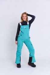 Spodnie ogrodniczki Yeh Girl - Aqua. Niebieskie spodnie materiałowe damskie OOSC, bez wzorów, z materiału, retro. Za 1,078.99 zł.