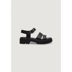 Buty sportowe Kobieta TIMBERLAND STST BACKSTRAP SANDAL. Czarne buty sportowe na co dzień damskie Timberland, bez wzorów, ze skóry. W wyprzedaży za 479.40 zł.