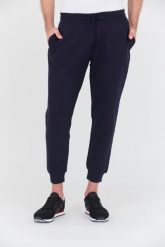 GUESS Granatowe spodnie dresowe Aldwin. Niebieskie spodnie dresowe męskie Guess, z aplikacjami, z dresówki. W wyprzedaży za 256.99 zł.