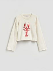 Sweter z haftem - kremowy. Białe swetry klasyczne damskie Reserved, l, z bawełny, bez kołnierzyka. Za 139.99 zł.