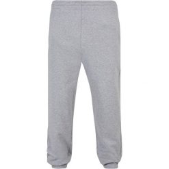 Spodnie dresowe Urban Classics Ultra Heavy. Szare spodnie dresowe męskie Urban Classics, bez wzorów, z bawełny. Za 267.50 zł.
