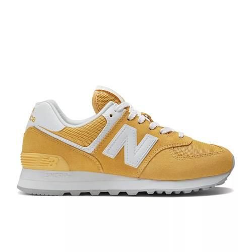Buty do chodzenia damskie New Balance 574. Żółte buty sportowe na co dzień damskie New Balance, bez wzorów, z materiału, trekkingowe, New Balance 574. Za 474.00 zł.