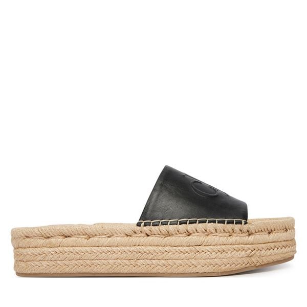 Espadryle Calvin Klein. Czarne espadryle damskie CALVIN KLEIN, bez wzorów, bez obcasa. Za 449.99 zł.
