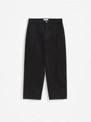 Spodnie wide leg - czarny. Czarne spodnie materiałowe męskie Reserved, bez wzorów, z bawełny. Za 159.99 zł.