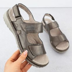 Skórzane sandały damskie na rzep metaliczne brązowe Rieker 60462-90. Brązowe sandały damskie Rieker, bez wzorów, ze skóry, bez obcasa. Za 297.49 zł.