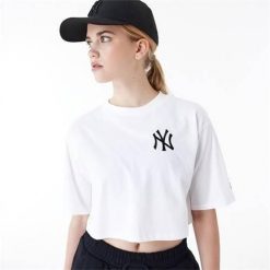 Koszulka sportowa damska New Era Neyyan. Białe bluzki sportowe damskie New Era, uniwersalny, bez wzorów, bez ramiączek. Za 267.00 zł.