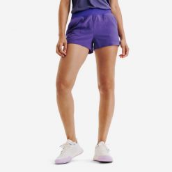 Spodenki do tenisa damskie Light Kuikma. Fioletowe szorty damskie KUIKMA, bez wzorów, z materiału, sportowe. Za 59.99 zł.