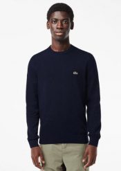 Klasyczny sweter Lacoste granatowy z okrągłym dekoltem. Niebieskie swetry męskie Lacoste, l, bez wzorów, z bawełny, bez kołnierzyka. Za 633.30 zł.
