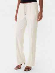 Juicy Couture Spodnie dresowe Tina JCWBJ225307 Beżowy Regular Fit. Brązowe spodnie dresowe damskie Juicy Couture, xs, bez wzorów, z dresówki. Za 399.99 zł.