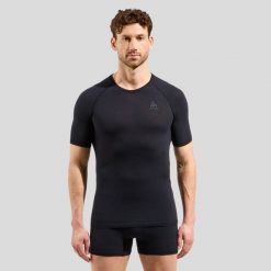 Koszulka termoaktywna męska Odlo Merino PW 140 Seamless BL Top Crew Neck SS. Czarne bielizna termoaktywna męska Odlo, na zimę, m, bez ramiączek. Za 320.90 zł.