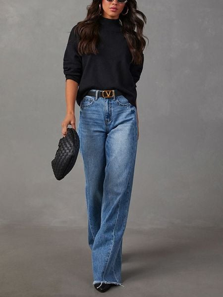 Milan Kiss Bluzka w kolorze czarnym rozmiar: M. Czarne bluzki damskie Milan Kiss, m, bez wzorów, bez kołnierzyka, bez ramiączek. Za 135.17 zł.