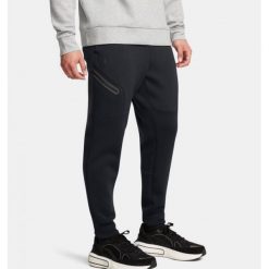 Spodnie męskie Under Armour Unstoppable Fleece. Czarne spodnie sportowe męskie Under Armour. Za 339.99 zł.