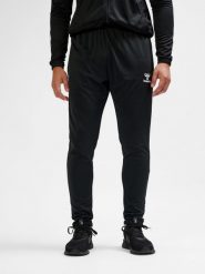 SPODNIE hmlESSENTIAL TRAINING PANTS. Czarne spodnie sportowe damskie HUMMEL, s, z materiału, do piłki nożnej. Za 154.00 zł.