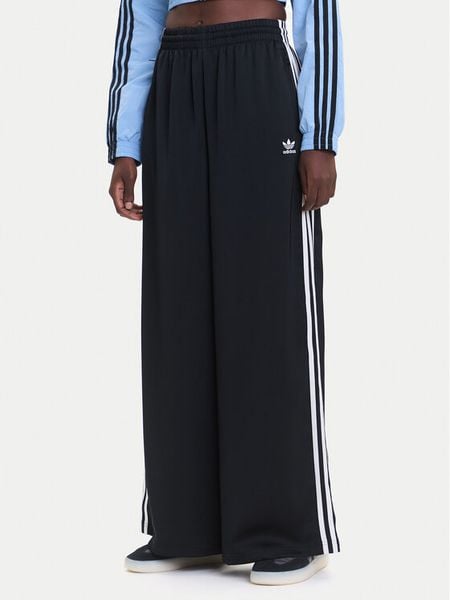 Adidas Spodnie dresowe adicolor Satin IU2520 Czarny Wide Leg. Czarne spodnie dresowe damskie Adidas, bez wzorów, z dresówki. Za 349.99 zł.