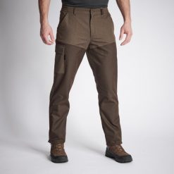 Spodnie outdoor Renfort 100. Brązowe spodnie materiałowe męskie SOLOGNAC, bez wzorów, z bawełny, sportowe. Za 129.99 zł.