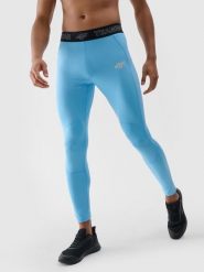 4F Legginsy treningowe szybkoschnące męskie - niebieskie XL. Niebieskie spodnie sportowe męskie 4f, z dzianiny. W wyprzedaży za 49.99 zł.