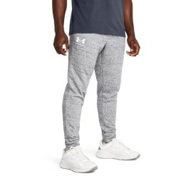 Spodnie męskie Under Armour Rival Terry. Niebieskie spodnie materiałowe męskie Under Armour, bez wzorów, z bawełny. Za 290.00 zł.