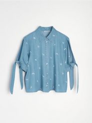 Lyocellowa koszula light denim z wiązanymi rękawami - niebieski. Niebieskie koszule damskie Sinsay, l, bez wzorów, z denimu, bez kołnierzyka, bez ramiączek. Za 59.99 zł.