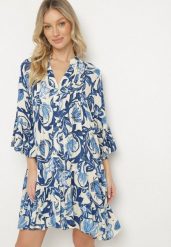 Niebieska Sukienka o Rozkloszowanym Kroju z Falbanami w Kwiatowy Wzór Ridivanna. Niebieskie sukienki damskie Born2be, na co dzień, l, bez wzorów, eleganckie, bez kołnierzyka, bez ramiączek, midi, rozkloszowane. W wyprzedaży za 127.99 zł.