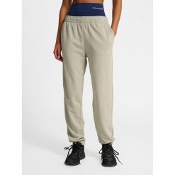 Damskie spodnie dresowe Hummel Pulse. Szare spodnie sportowe damskie HUMMEL, z dresówki, na fitness i siłownię. Za 137.00 zł.