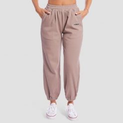 Spodnie dresowe damskie oversize z kieszeniami Roux Aura. Brązowe spodnie sportowe damskie GYMBEAM, s, z bawełny, na fitness i siłownię. Za 131.90 zł.