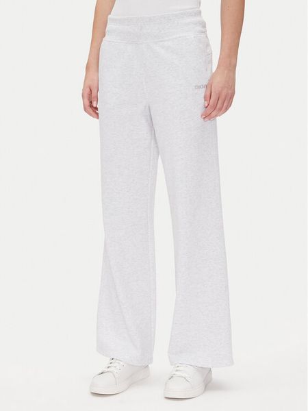 DKNY Sport Spodnie dresowe DP5P3601 Biały Regular Fit. Białe spodnie dresowe damskie DKNY Sport, l, z dresówki. Za 179.99 zł.