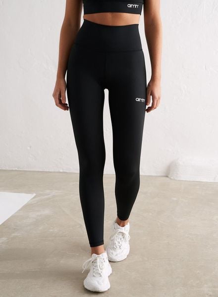 Damskie legginsy z wysokim stanem, squat proof, z tylną kieszenią Core czarne. Czarne legginsy damskie Aim'n, s, bez wzorów, z elastanu. Za 296.00 zł.
