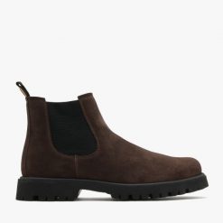 Ciemnobrązowe sztyblety z kolorową taśmą TRAVIS. Brązowe sztyblety męskie Ryłko, z tkaniny, bez zapięcia. Za 499.99 zł.