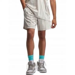 Spodnie treningowe męskie Nike DM1357104. Białe spodnie sportowe męskie Nike, z materiału. Za 263.00 zł.