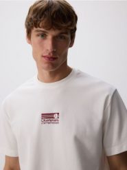 T-shirt comfort fit - biały. Białe t-shirty męskie Reserved, l, bez wzorów, z bawełny, bez kołnierzyka. Za 69.99 zł.
