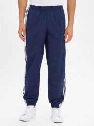 Adidas Originals Męskie spodnie dresowe - Firebird Mężczyźni niebieski jednolity, M. Niebieskie spodnie sportowe męskie adidas Originals, z dresówki. Za 299.95 zł.