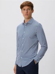 Koszula slim fit - granatowy. Niebieskie koszule męskie Reserved, l, bez wzorów, z dzianiny, bez kołnierzyka, bez ramiączek. Za 129.99 zł.