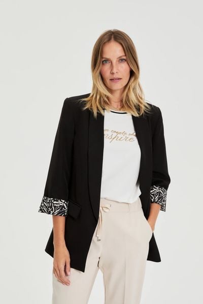 Marynarka z ozdobnymi mankietami czarna. Czarne marynarki i żakiety damskie MOODO, l, bez wzorów, z elastanu. Za 179.99 zł.