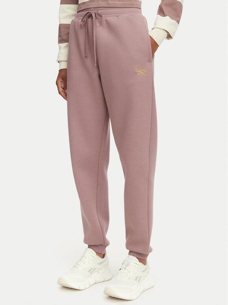 Reebok Spodnie dresowe Zana RK25690CC Brązowy Regular Fit. Brązowe spodnie dresowe damskie Reebok, m, bez wzorów, z bawełny. Za 259.99 zł.