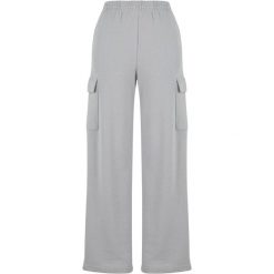 Damskie spodnie dresowe loose fit Urban Classics Light Terry. Szare spodnie dresowe damskie Urban Classics, z bawełny, do biegania. Za 171.50 zł.