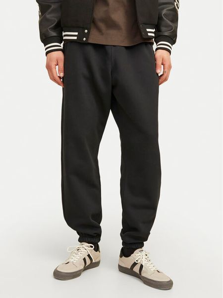 Jack & Jones Spodnie dresowe Bill Urban Edge 12263026 Czarny Relaxed Fit. Czarne spodnie dresowe męskie Jack & Jones, bez wzorów, z dresówki. Za 209.99 zł.