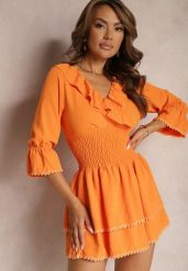 Pomarańczowa Kopertowa Sukienka z Ozdobną Falbanką i Gumką w Talii Tesora. Brązowe sukienki damskie Renee, na co dzień, m, bez wzorów, eleganckie, bez kołnierzyka, bez ramiączek, mini, kopertowe. Za 79.99 zł.