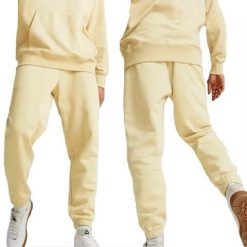 Spodnie sportowe męskie dresowe Puma Classic. Brązowe spodnie dresowe męskie Puma, l, z dresówki. Za 119.00 zł.