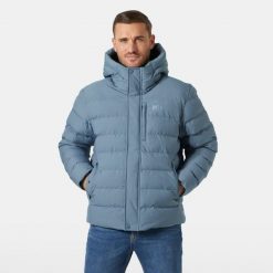 Ocieplana kurtka z kapturem Helly Hansen Alby. Niebieskie kurtki męskie Helly Hansen, bez wzorów, z puchu, sportowe, z kapturem. W wyprzedaży za 990.05 zł.